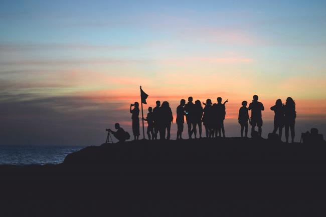 group of people in sunset group of people in sunset
